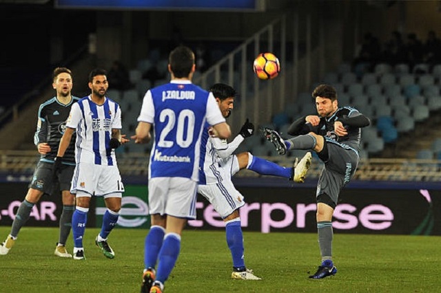 Planas of RC Celta Vigoduels for the ball with Carlos Vela of Real Sociedad during the Spanish league football match between Real Sociedad and Celta at the Anoeta Stadium in San Sebastian on 22 January, 2017 (Photo by Jose Ignacio Unanue/NurPhoto via Getty Images)